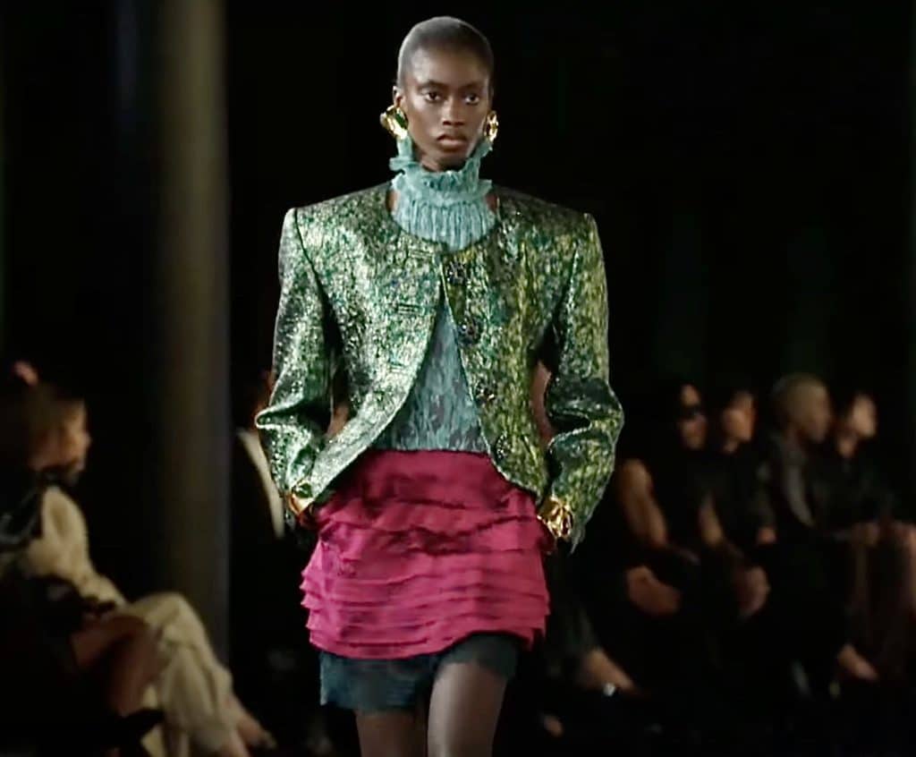 watermelon colored outfit with large blazer with shoulder pads